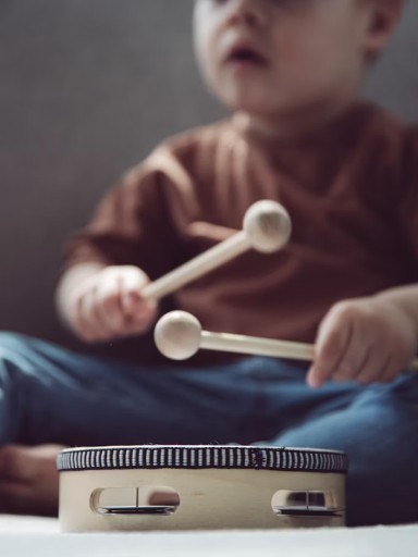 A child making music in a Music Together class